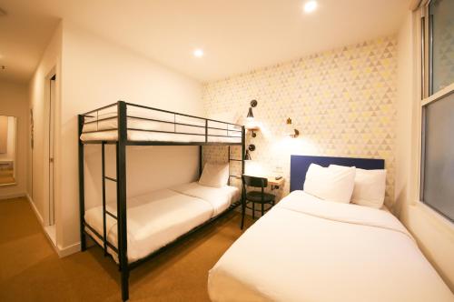 Habitación Triple del hotel Doxie. Foto 3