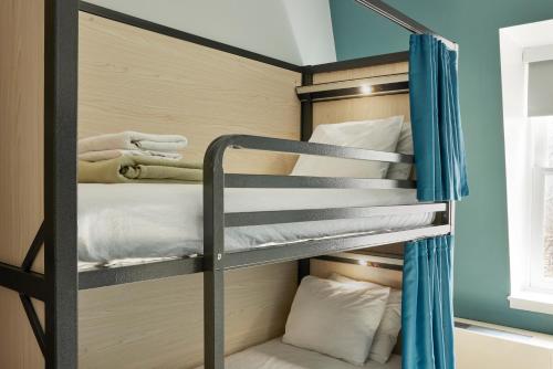 Cama en habitación compartida de 12 camas - Solo mujeres del hotel HI New York City. Foto 4