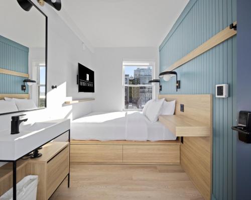 Alojamiento con vistas al río - Cama grande del hotel Riverside Tower Hotel. Foto 3