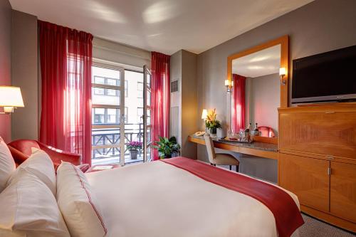 Habitación con cama grande del hotel Hotel Giraffe. Foto 4