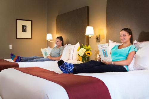 Habitación Cuádruple con balcón del hotel Hotel Giraffe. Foto 5