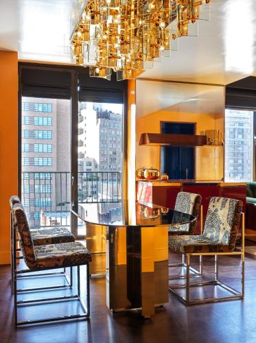 Estudio Deluxe con cama grande del hotel The Manner, The Unbound Collection by Hyatt. Foto 1