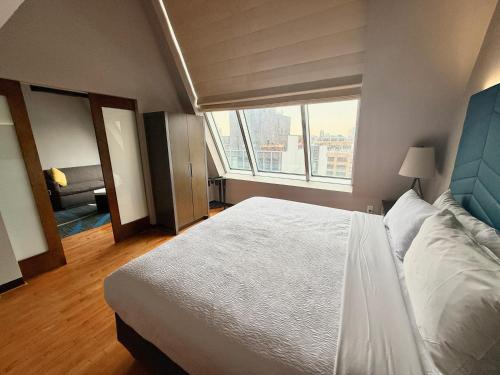 King Suite with Sofa Bed and Skyline View - High Floor del hotel Four Points by Sheraton Manhattan SoHo Village. Foto 8