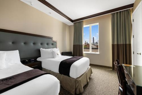 Suite Doble con 1 dormitorio - 2 camas - No fumadores del hotel Condor Hotel Brooklyn. Foto 2