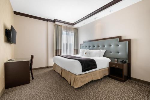 Suite Deluxe con 1 dormitorio y cama extragrande - No fumadores del hotel Condor Hotel Brooklyn. Foto 4