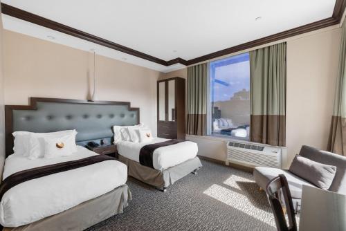 Habitación Doble Esquinera - 2 camas - No fumadores del hotel Condor Hotel Brooklyn. Foto 8