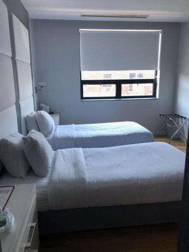 Habitación Doble Estándar - 2 camas del hotel The Ridge. Foto 11