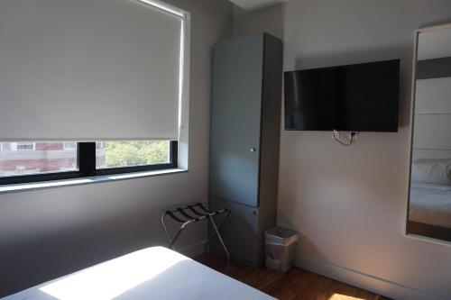 Habitación Estándar - Cama extragrande del hotel The Ridge. Foto 16