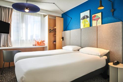 Habitación Doble Estándar - 2 camas del hotel ibis Paris Avenue d'Italie 13ème. Foto 6
