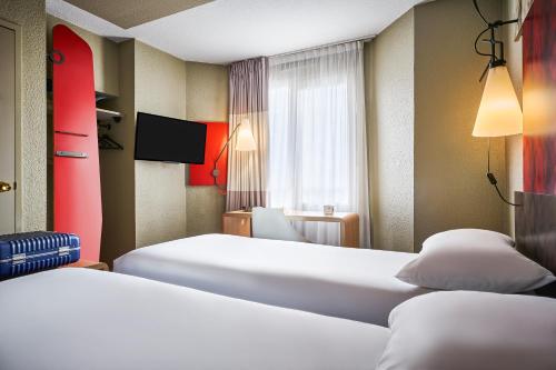 Habitación Doble Estándar - 2 camas del hotel ibis Paris Avenue d'Italie 13ème. Foto 7