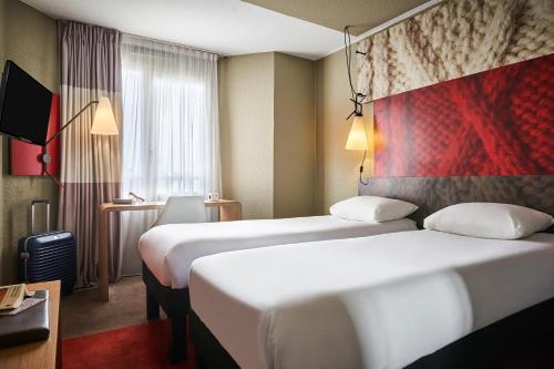 Habitación Doble Estándar - 2 camas del hotel ibis Paris Avenue d'Italie 13ème. Foto 10