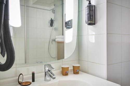 Habitación Doble Estándar - 2 camas del hotel ibis Paris Avenue d'Italie 13ème. Foto 14
