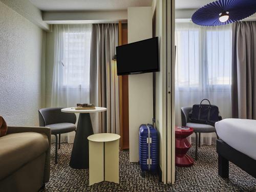 Habitación Superior (1 cama doble y 1 sofá cama) del hotel ibis Paris Avenue d'Italie 13ème. Foto 1