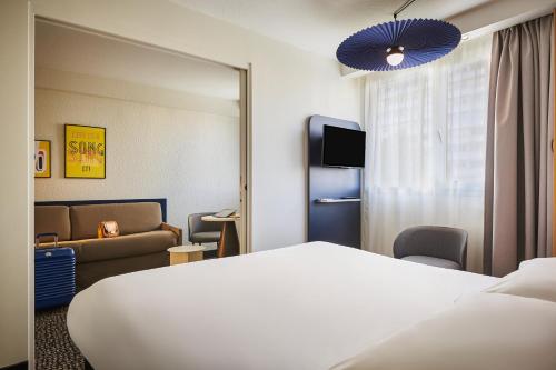 Habitación Superior (1 cama doble y 1 sofá cama) del hotel ibis Paris Avenue d'Italie 13ème. Foto 5