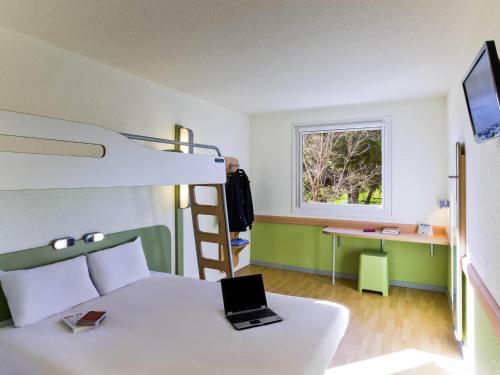 Habitación Familiar del hotel Ibis budget Madrid Alcala de Henares La Dehesa
