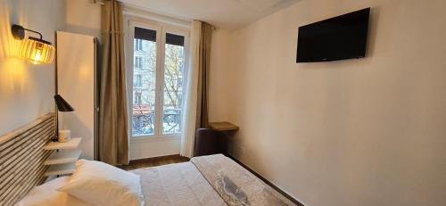 Double Room with Bathtub (without lift) del hotel Camelia Prestige - Place de la Nation. Foto 4