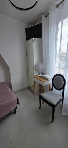 Single Room (without lift) del hotel Camelia Prestige - Place de la Nation. Foto 3
