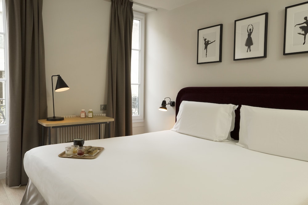 Habitación superior con 1 cama doble o 2 individuales del hotel Monsieur Helder