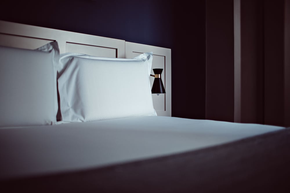 Habitación Deluxe con 1 cama doble o 2 individuales del hotel Monsieur Helder. Foto 5