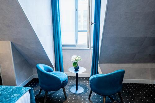 Alojamiento Superior en planta superior con vistas a la ciudad del hotel de la Paix. Foto 2