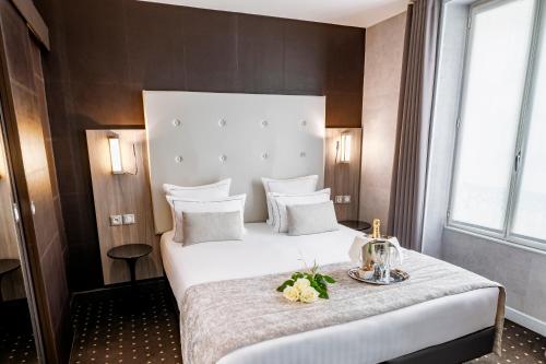 Habitación Triple Deluxe del hotel de la Paix