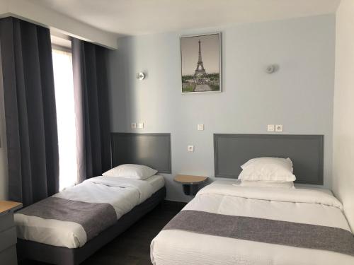 Habitación Triple del hotel Clauzel. Foto 4