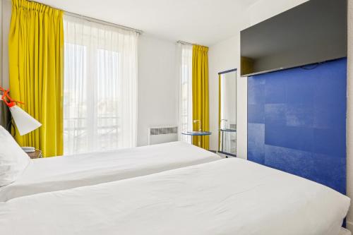 Habitación Doble Estándar - 2 camas del hotel ibis Styles Paris République Le Marais. Foto 4