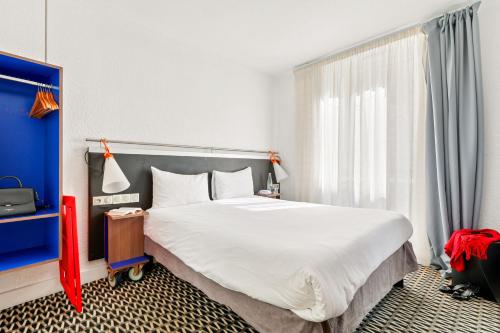 Habitación Doble Estándar del hotel ibis Styles Paris République Le Marais. Foto 4