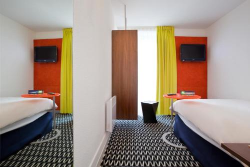 Habitación Individual Estándar del hotel ibis Styles Paris République Le Marais. Foto 7