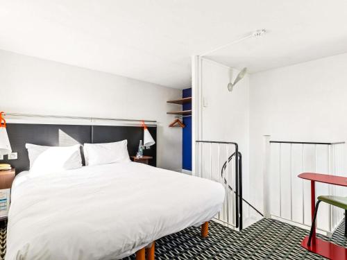 Habitación Estándar - 1 cama doble y 1 individual del hotel ibis Styles Paris République Le Marais. Foto 2