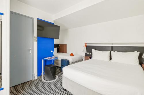 Habitación Estándar - 1 cama doble y 1 individual del hotel ibis Styles Paris République Le Marais. Foto 4
