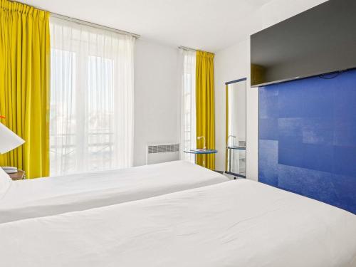 Habitación Doble Estándar - 2 camas del hotel ibis Styles Paris République Le Marais. Foto 5
