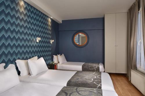 Habitación Triple del hotel Garden Saint Martin. Foto 1