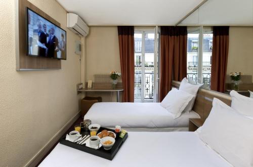 Habitación Doble - 2 camas del hotel De France Quartier Latin. Foto 4