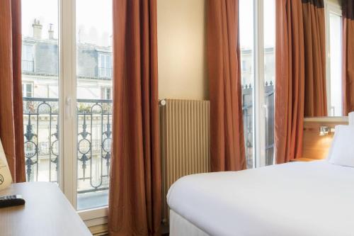 Habitación Doble del hotel De France Quartier Latin. Foto 10