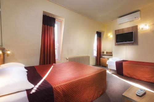 Habitación Triple del hotel De France Quartier Latin