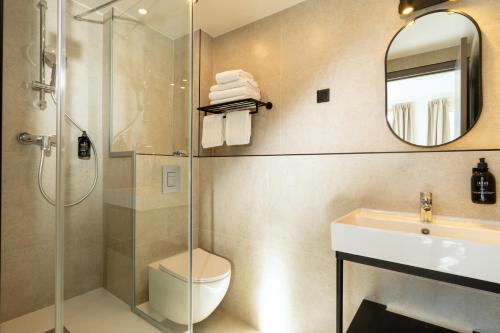 Habitación Triple del hotel De L'exposition République. Foto 1