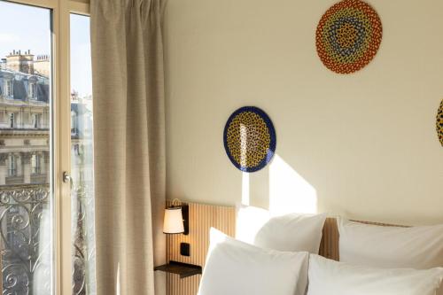 Habitación Triple del hotel De L'exposition République. Foto 4