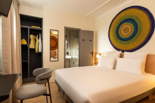 Habitación cuádruple del hotel De L'exposition République. Foto 1