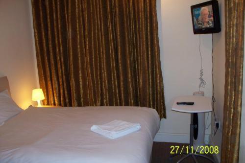 Habitación Doble con baño privado del hotel Citystay. Foto 1