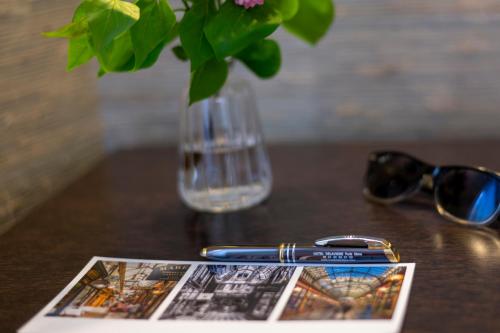 Habitación Triple Deluxe del hotel Delavigne