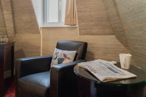 Habitación Triple Deluxe del hotel Delavigne. Foto 2