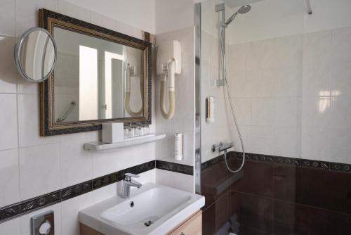 Habitación Triple Deluxe del hotel Delavigne. Foto 4