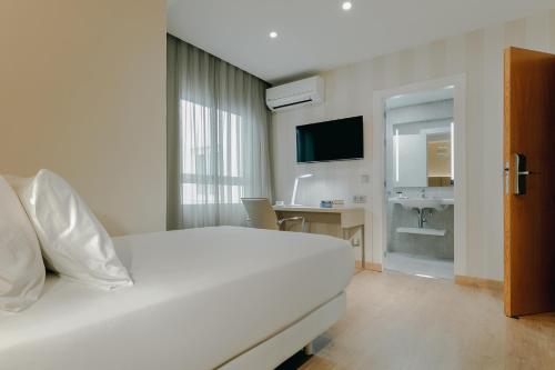 Habitación Individual Estándar del hotel Hesperia Murcia Centro. Foto 2