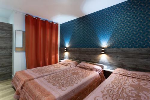 Habitación Triple del hotel Léonard De Vinci. Foto 3