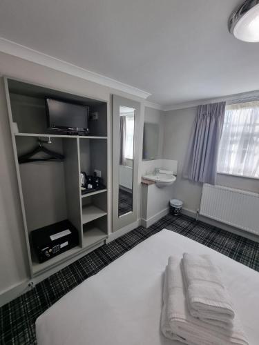 Habitación individual con aseo compartido del hotel Howard Winchester