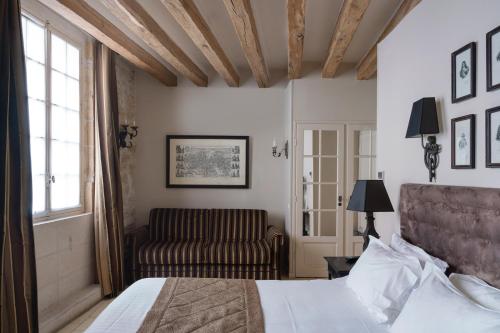 Habitación cuádruple del hotel Saint-Louis Marais. Foto 2