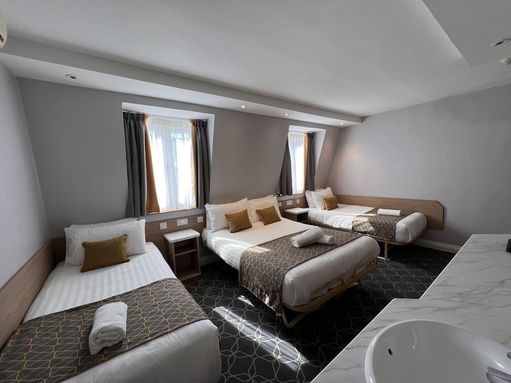 Family Room with Private Bathroom del hotel The Jesmond Dene – St Pancras Group. Foto 2