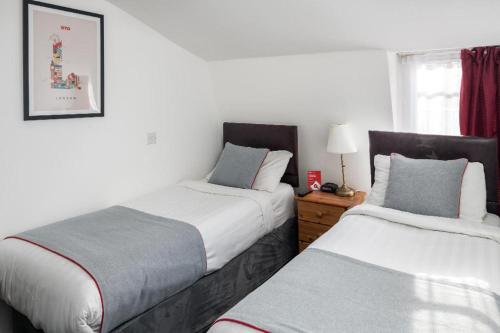 Habitación Doble Estándar - 2 camas del hotel Apollo Kings Cross. Foto 6
