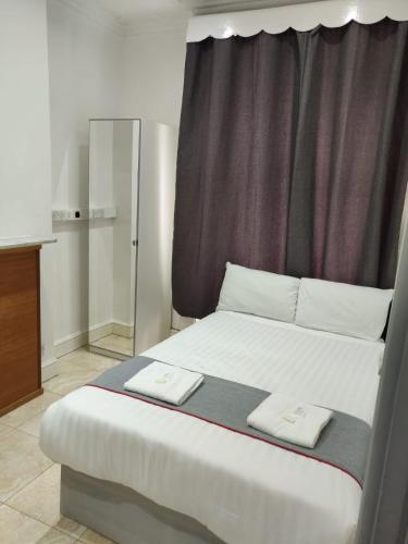 Habitación Doble con baño compartido del hotel Apollo Kings Cross. Foto 3